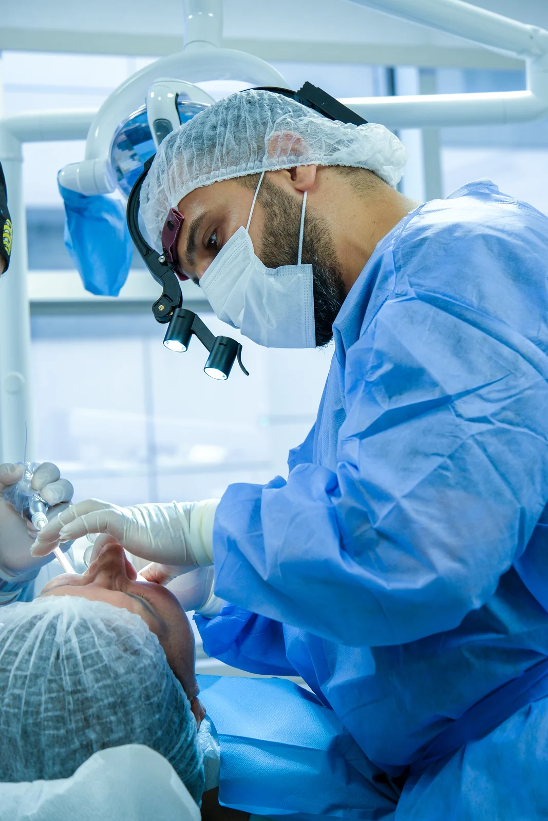 DentVisit oral surgeon performing a dental procedure